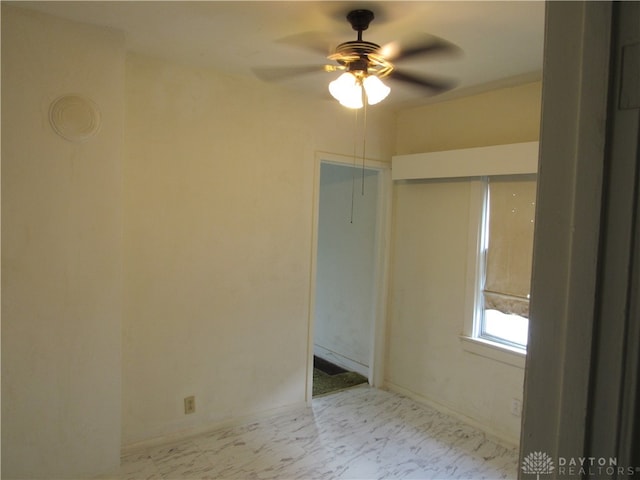 empty room with ceiling fan