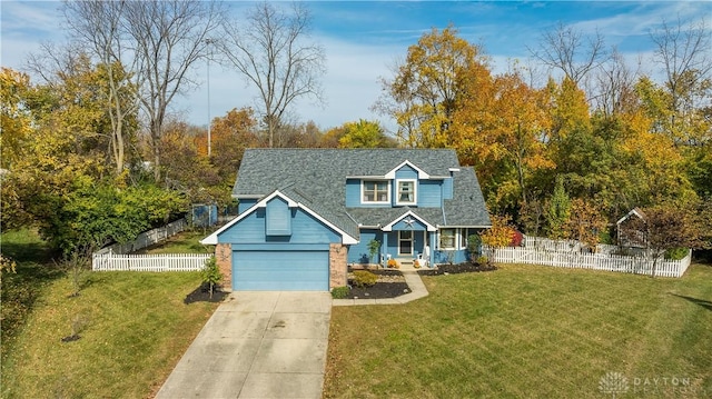 view of front facade featuring a garage and a front yard