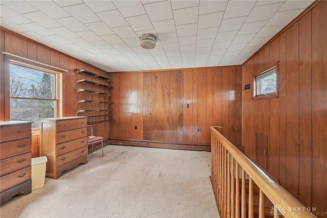 office space with wood walls