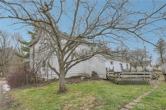 view of yard featuring a wooden deck