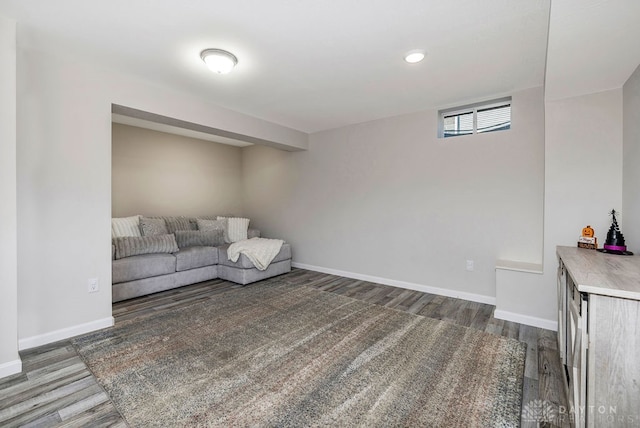 living area with dark wood-type flooring