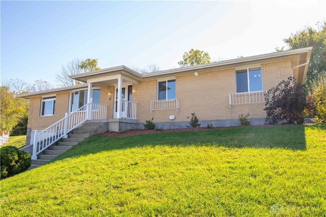 single story home with a front yard