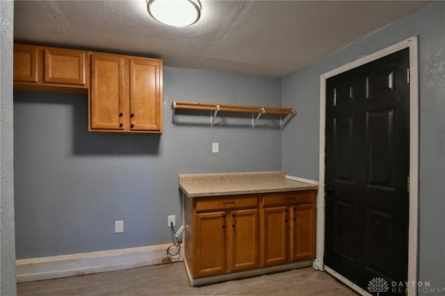 washroom featuring light hardwood / wood-style floors