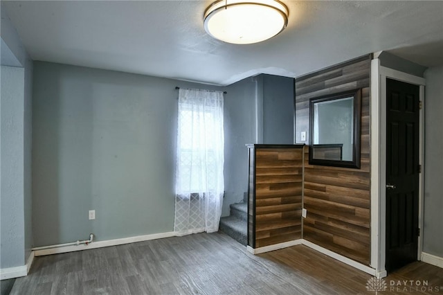 spare room featuring hardwood / wood-style floors