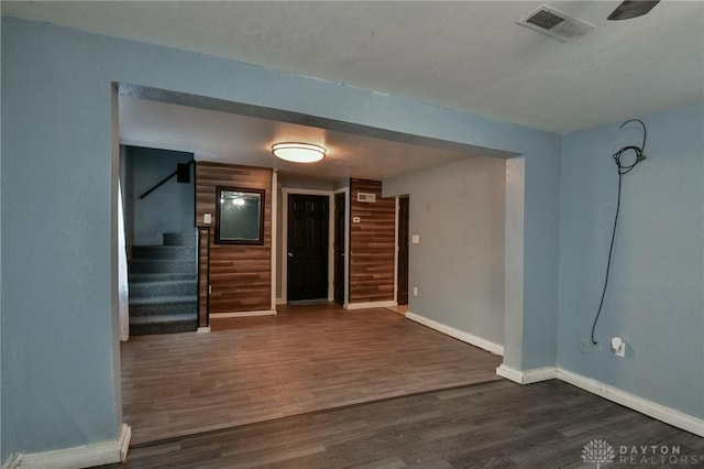 spare room featuring dark hardwood / wood-style flooring