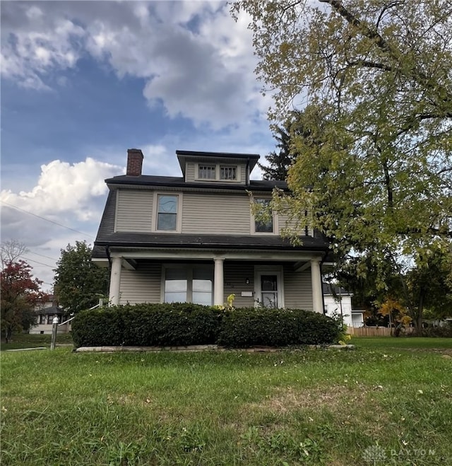 view of front of home with a front yard