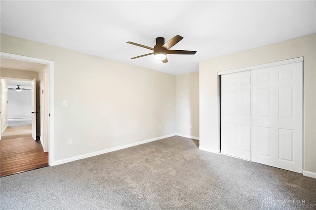 unfurnished bedroom with carpet flooring, a closet, and ceiling fan