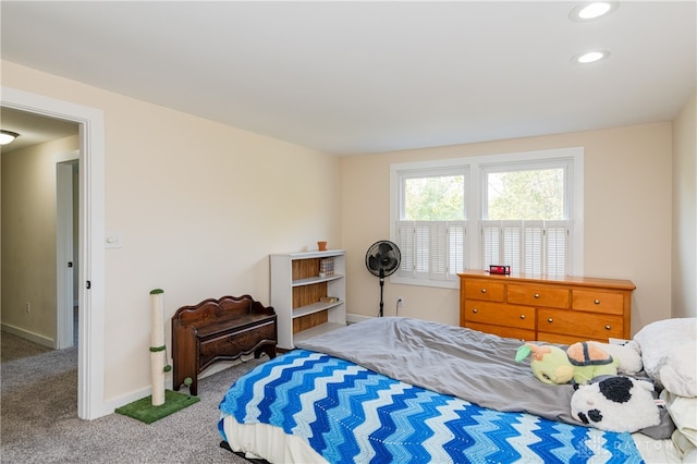 bedroom with light colored carpet