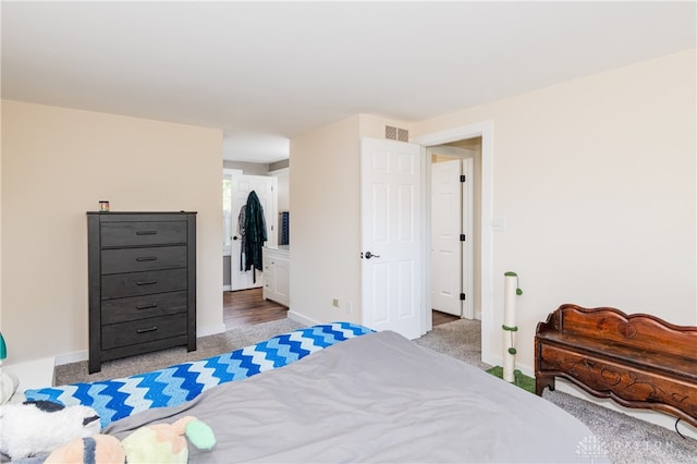 bedroom featuring carpet