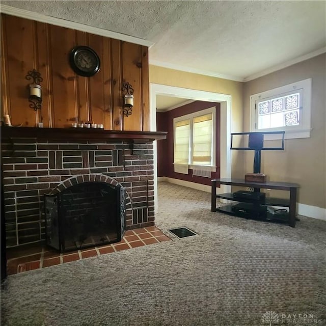 carpeted living room with a healthy amount of sunlight, crown molding, a textured ceiling, and a brick fireplace