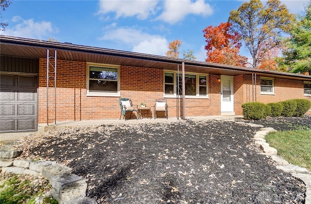 ranch-style home with a garage