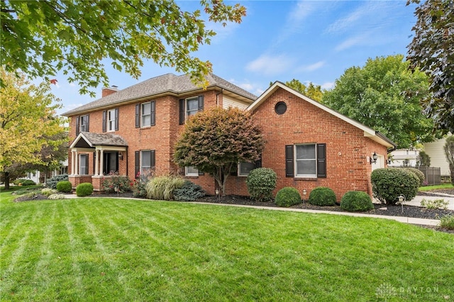 view of front of property with a front lawn