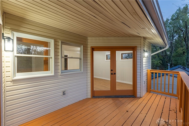 wooden terrace featuring french doors