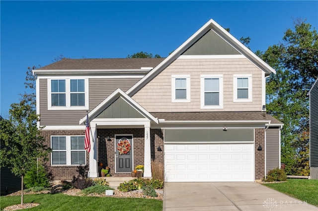 view of front facade featuring a front yard and a garage