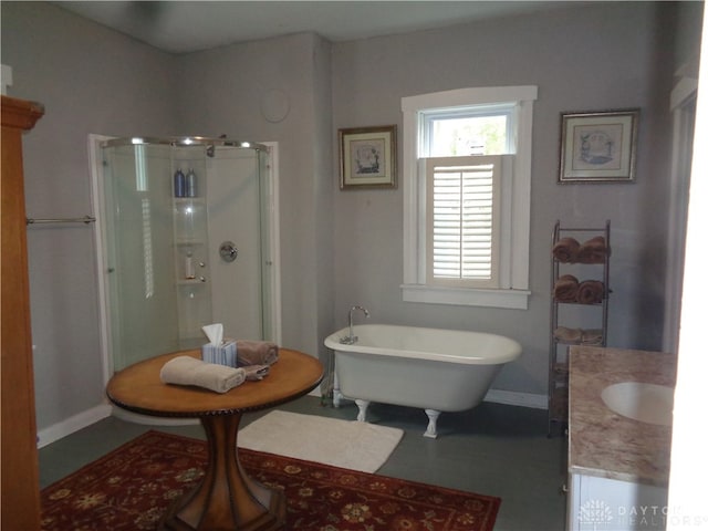 bathroom featuring vanity and independent shower and bath