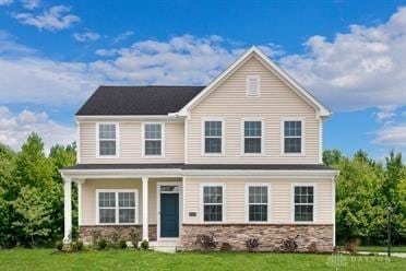 view of front of home with a front yard