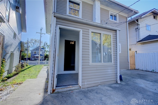 property entrance featuring a patio