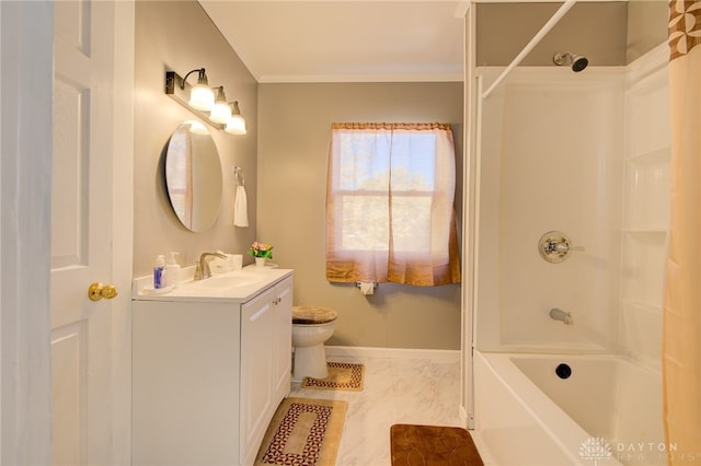 full bathroom featuring vanity, crown molding, washtub / shower combination, and toilet