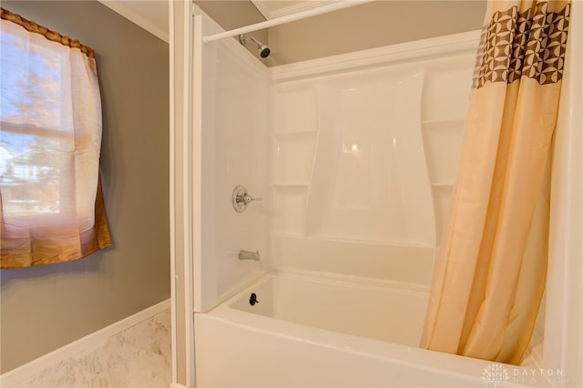 bathroom featuring shower / tub combo with curtain