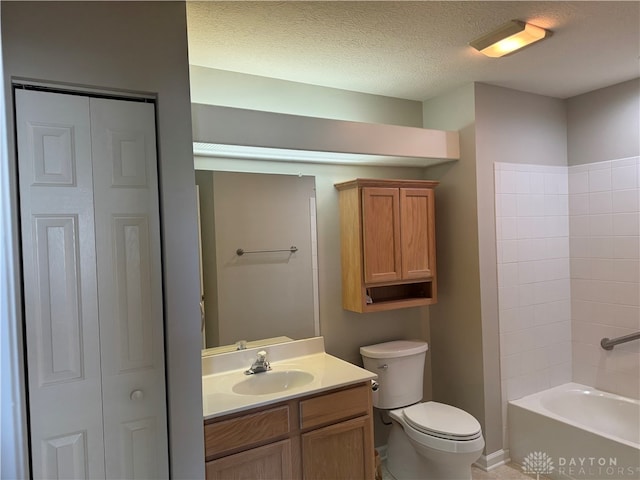 full bathroom featuring toilet, shower / tub combination, vanity, and a textured ceiling