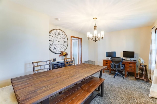 office featuring carpet flooring and an inviting chandelier