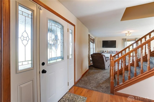 entryway featuring a healthy amount of sunlight and light wood-type flooring