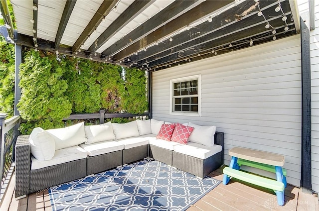 wooden terrace featuring outdoor lounge area