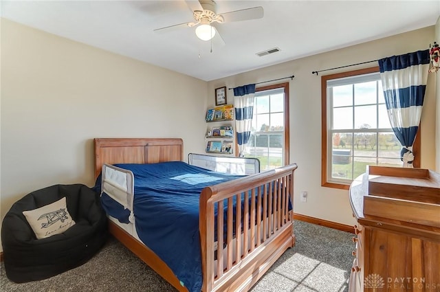 carpeted bedroom featuring ceiling fan