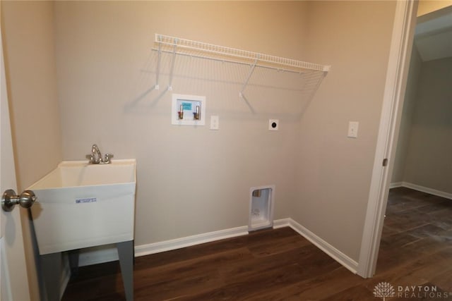 clothes washing area featuring electric dryer hookup, hookup for a washing machine, dark wood-type flooring, and sink