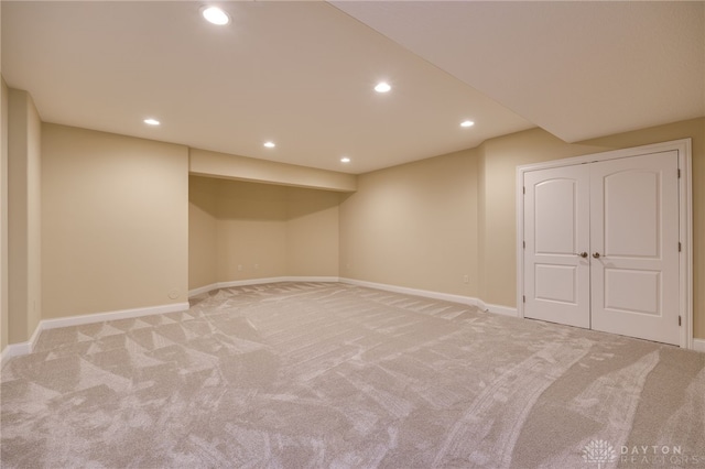 basement with light carpet