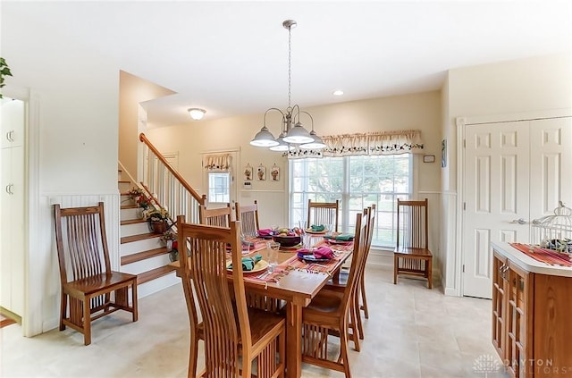 dining area with a notable chandelier