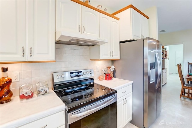 kitchen featuring white cabinets, backsplash, and stainless steel appliances