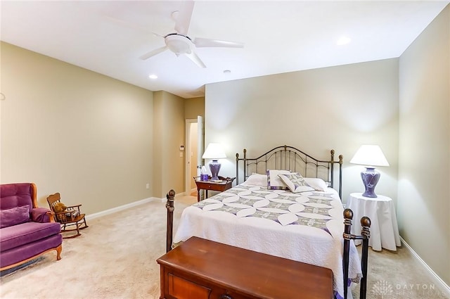 bedroom with light colored carpet and ceiling fan