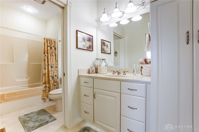 full bathroom featuring tile patterned flooring, vanity, shower / bath combo, and toilet