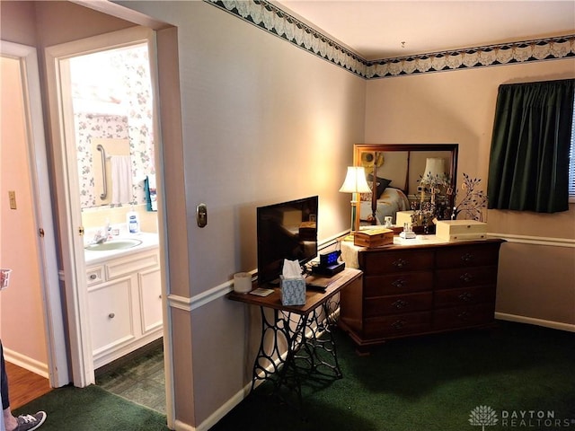 carpeted bedroom with sink