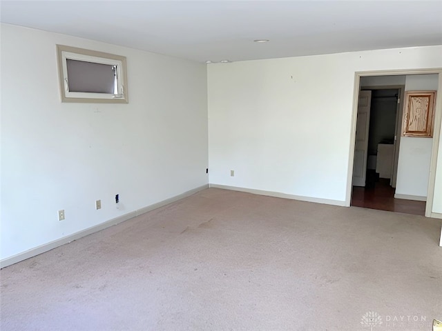 empty room featuring carpet flooring