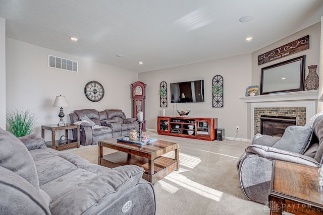 living room with light colored carpet and a fireplace