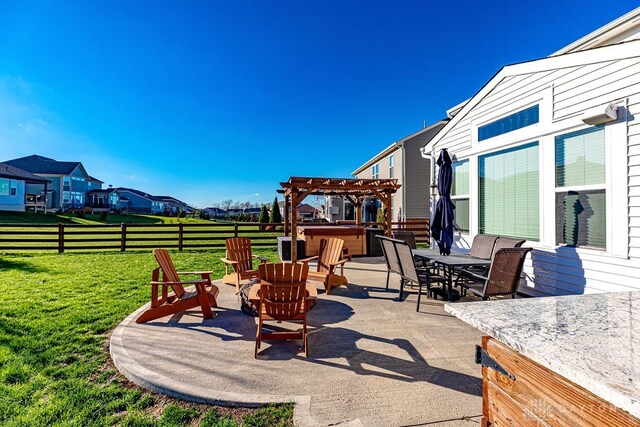 view of patio / terrace featuring a hot tub and a pergola