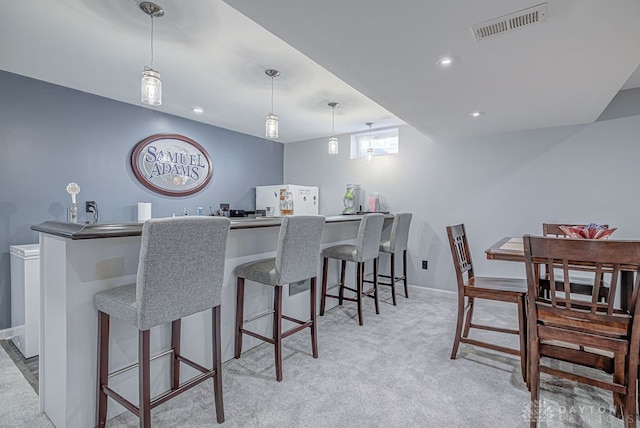 interior space featuring indoor bar