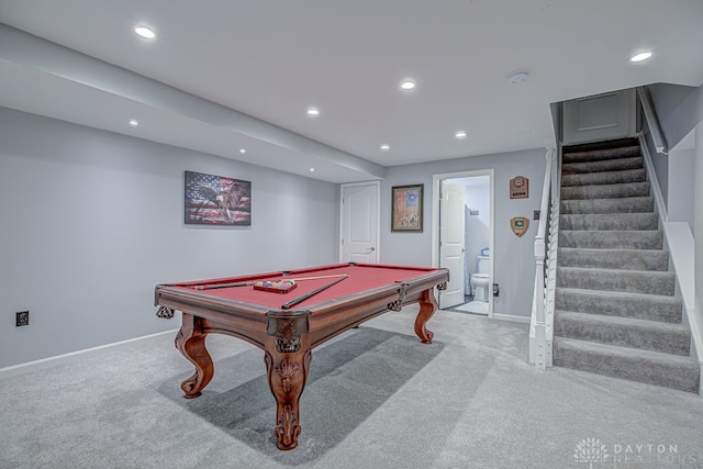 game room with pool table and light colored carpet