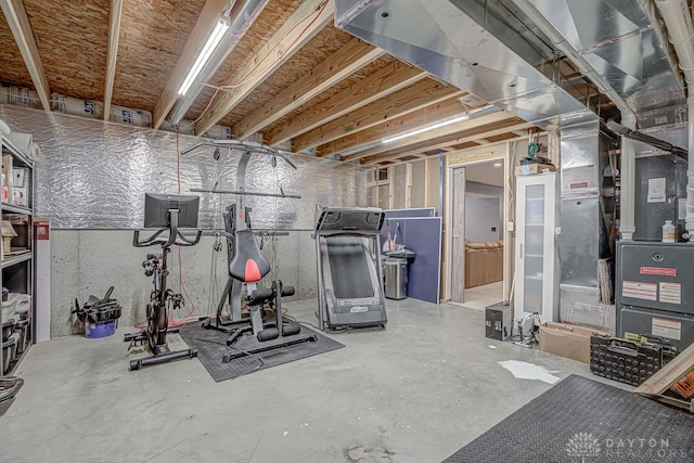 exercise room featuring concrete floors