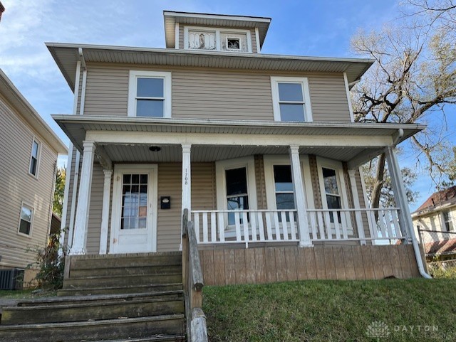 view of front of home with central air condition unit and covered porch