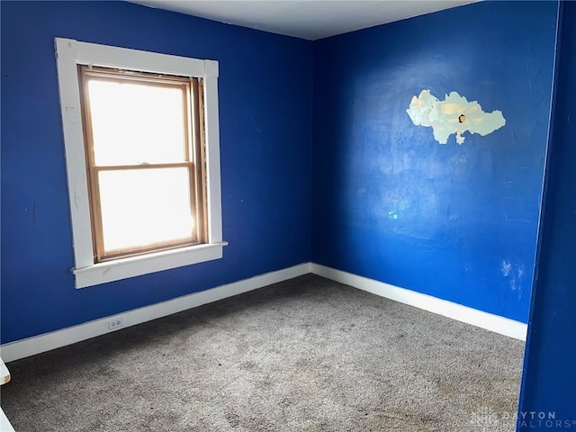 view of carpeted spare room