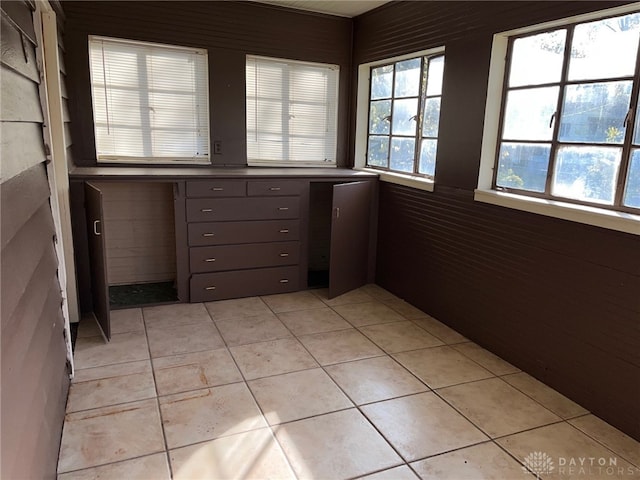 interior space featuring light tile patterned floors