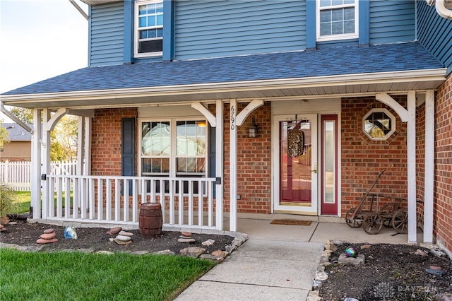 entrance to property with a porch