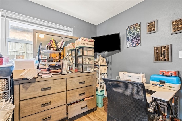 home office featuring light wood-type flooring