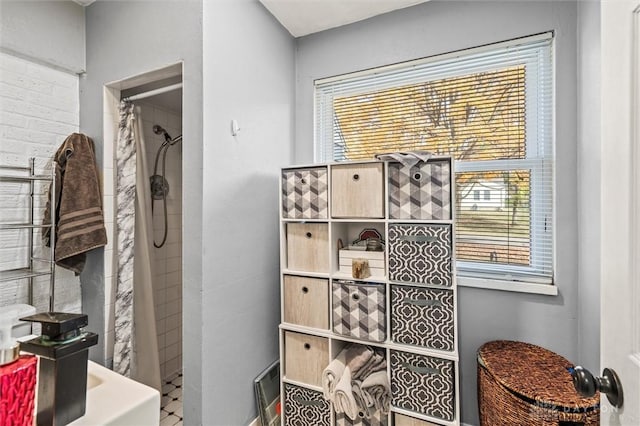 bathroom with curtained shower