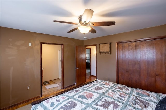 unfurnished bedroom with light wood-type flooring, a closet, and ceiling fan