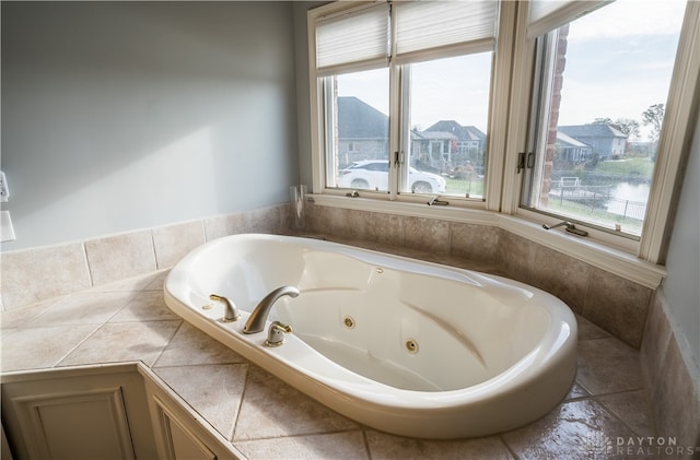 bathroom featuring tiled bath