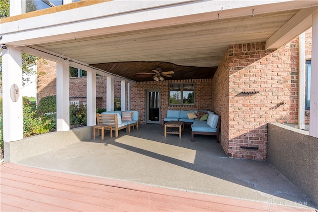 view of patio featuring ceiling fan and an outdoor living space